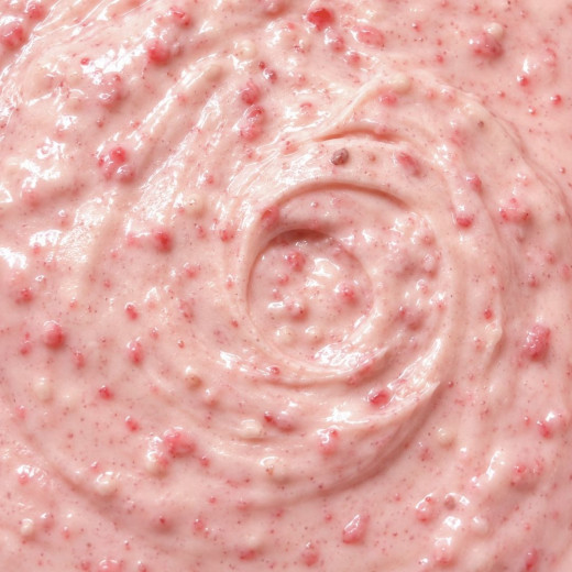 Creamy texture of the pink praline spread, with visible praline pieces