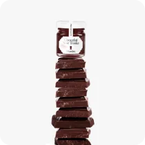 La Chambre chocolate spread jar on a mountain of gourmet chocolate squares