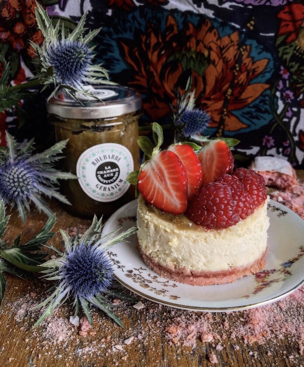 Cheesecake with rose, Rhubarb & Geranium jam, fresh strawberries & raspberries